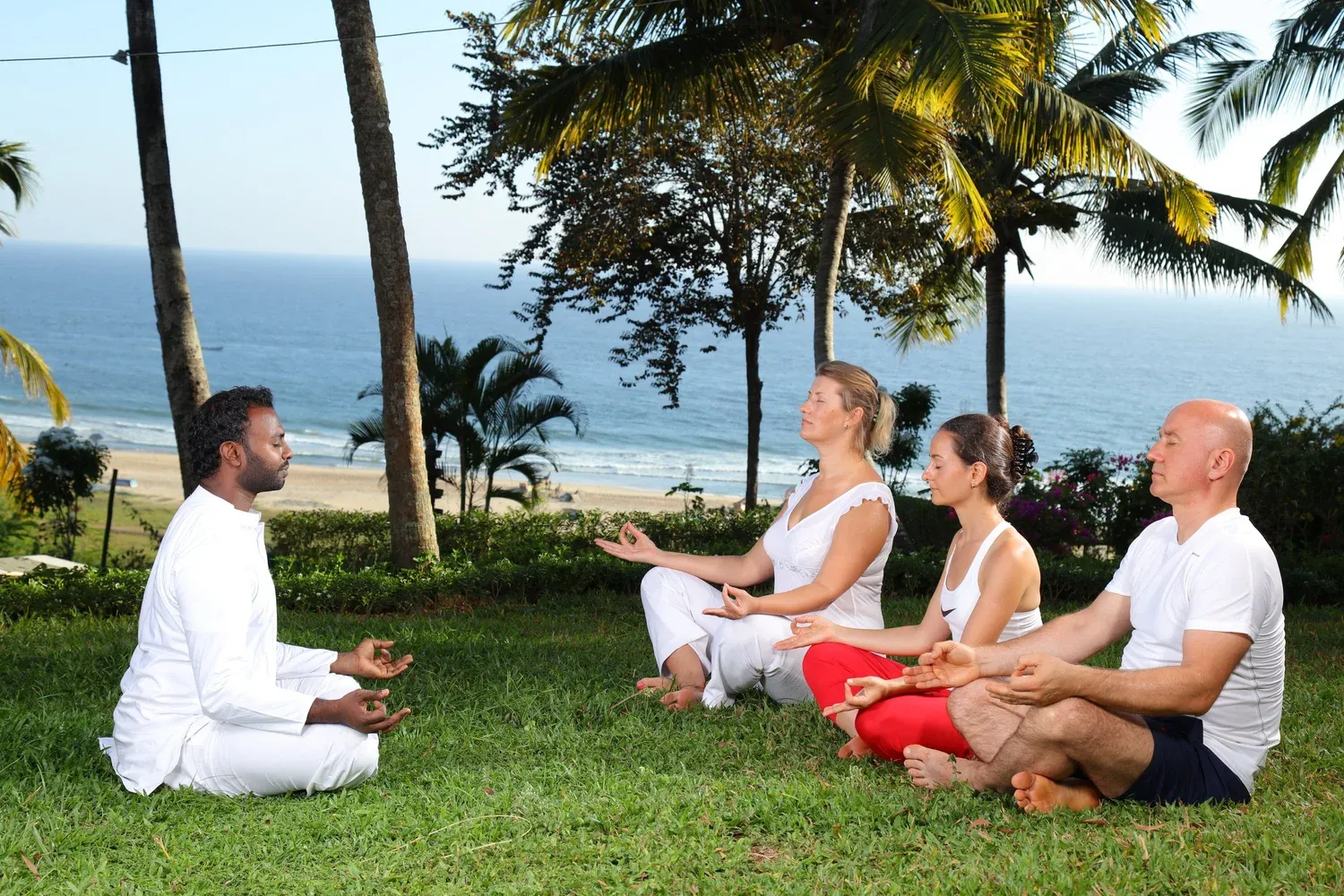 Guests relaxing together in a resort garden